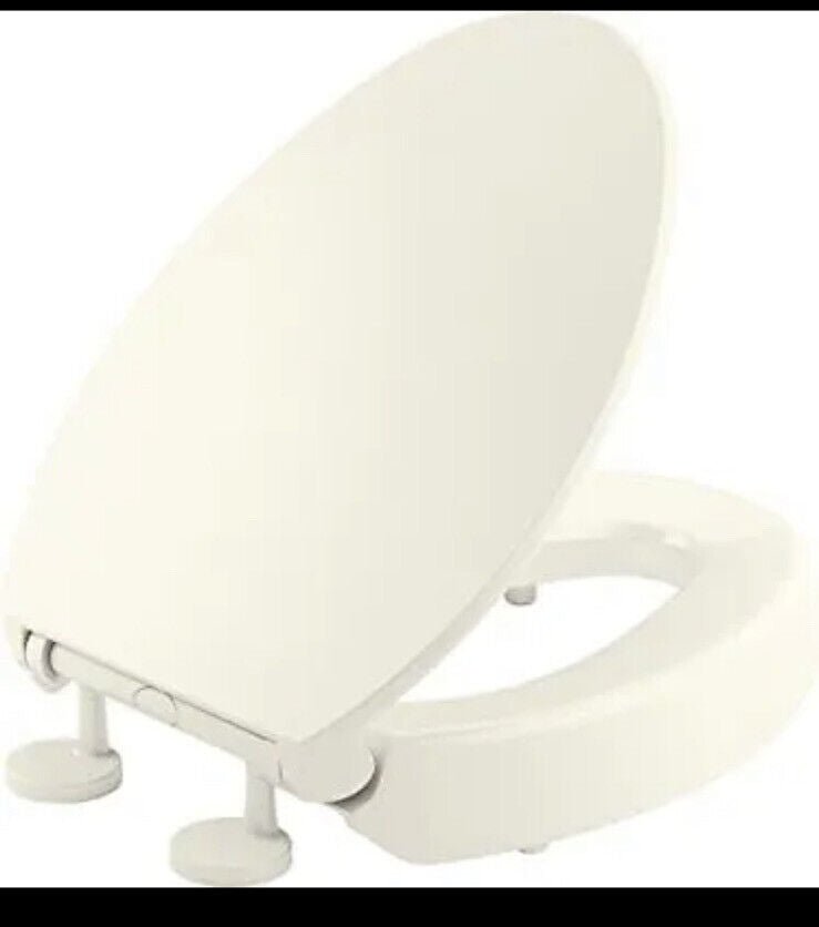 KOHLER Hyten Elevated QuietClose RoundFront Toilet Seat in Biscuit